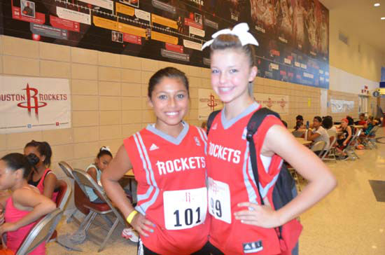 Two young dancers are lined up to audition for...
